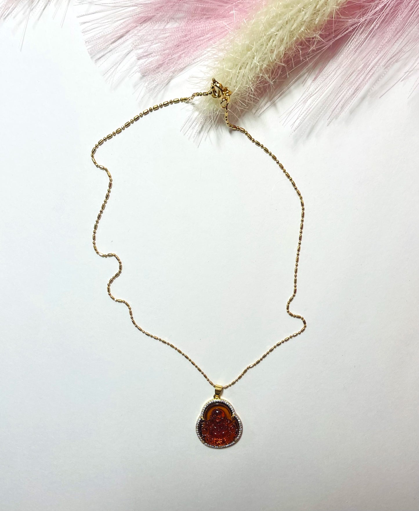 AMBER BUDDHA NECKLACE